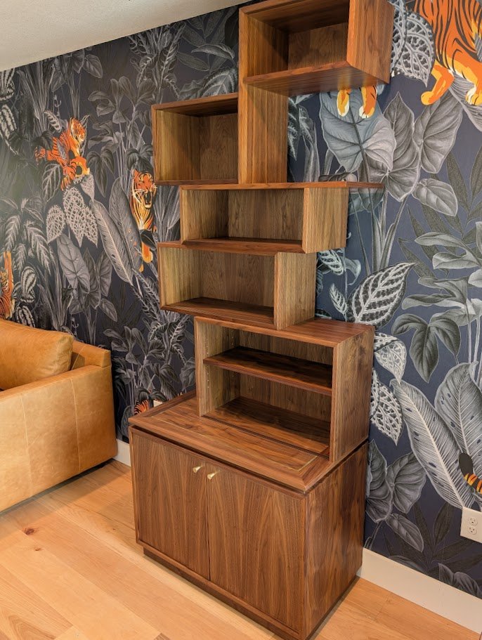 Stacked box bookcase in walnut with brass accents