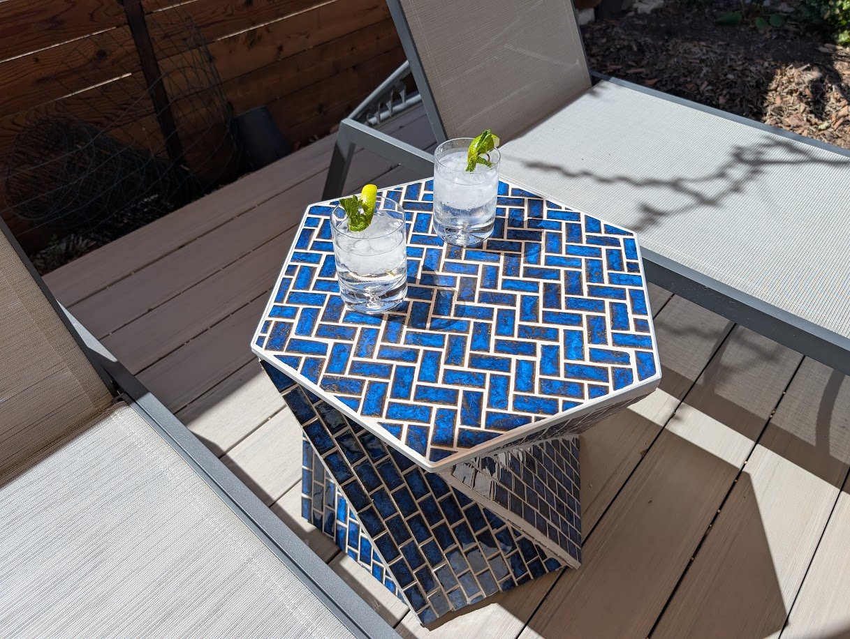 Blue tile poolside table